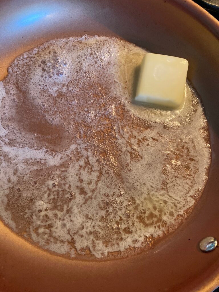 butter in skillet