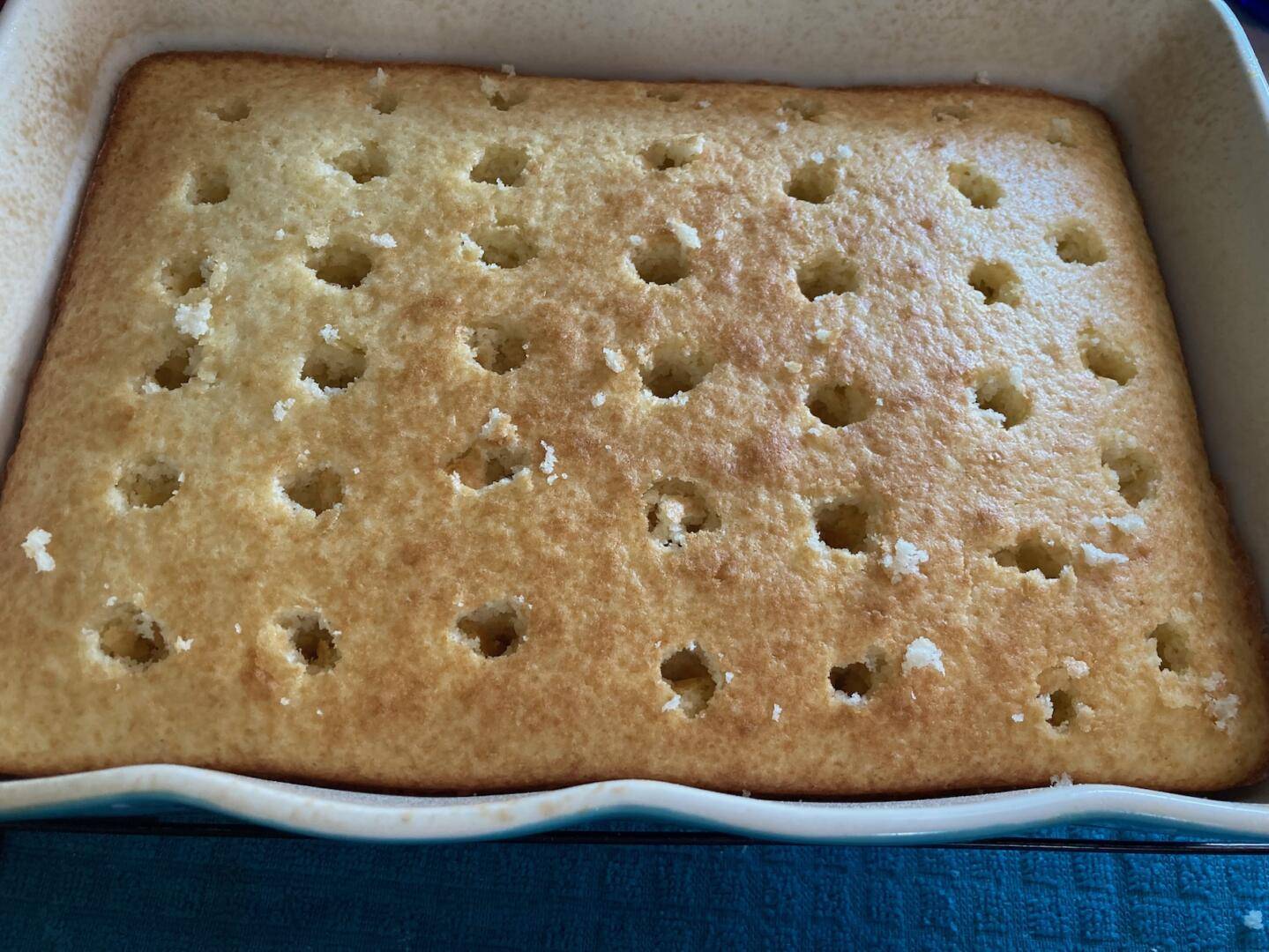 Cinnamon Roll Poke Cake from Out of the Box Baking.com