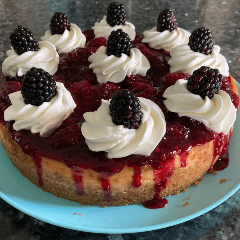 Classic Homemade Cheesecake with Blackberry Topping