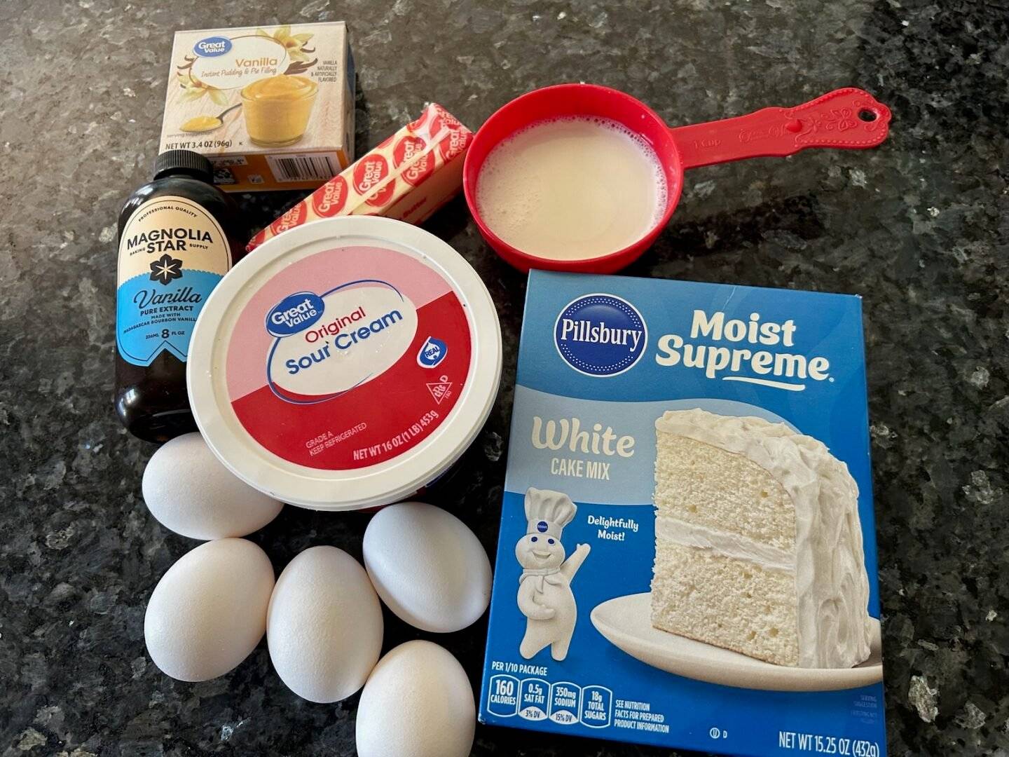 pound cake ingredients: white cake, sour cream, eggs, milk, butter, instant pudding, vanilla