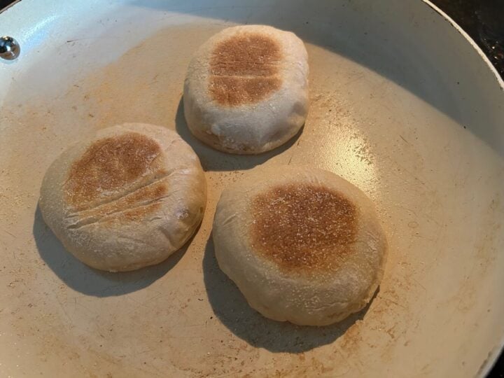 English muffins in pan