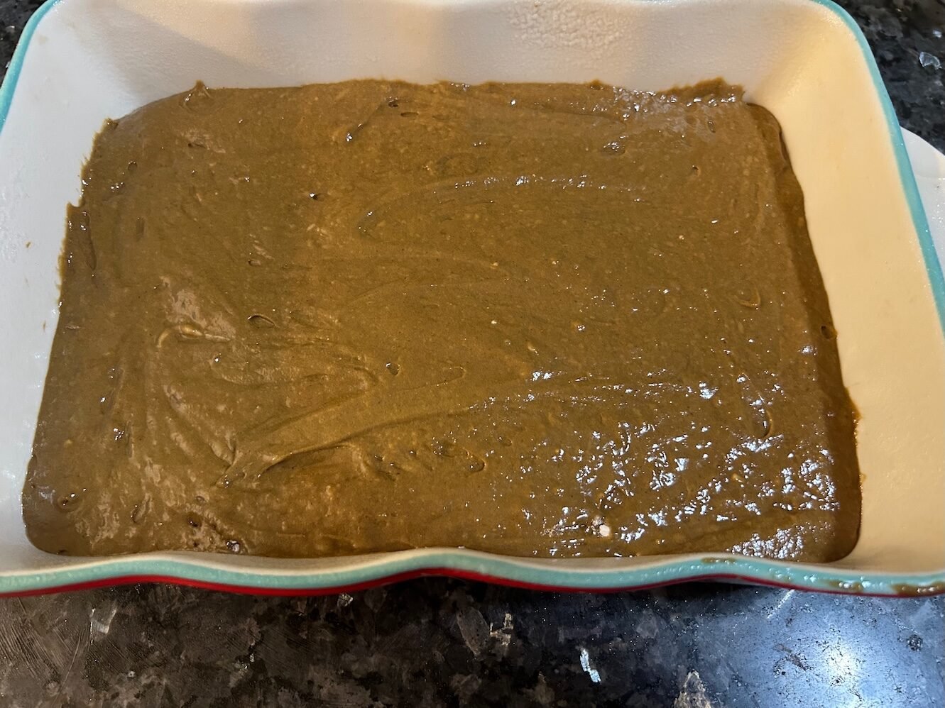 cake batter in rectangular pan