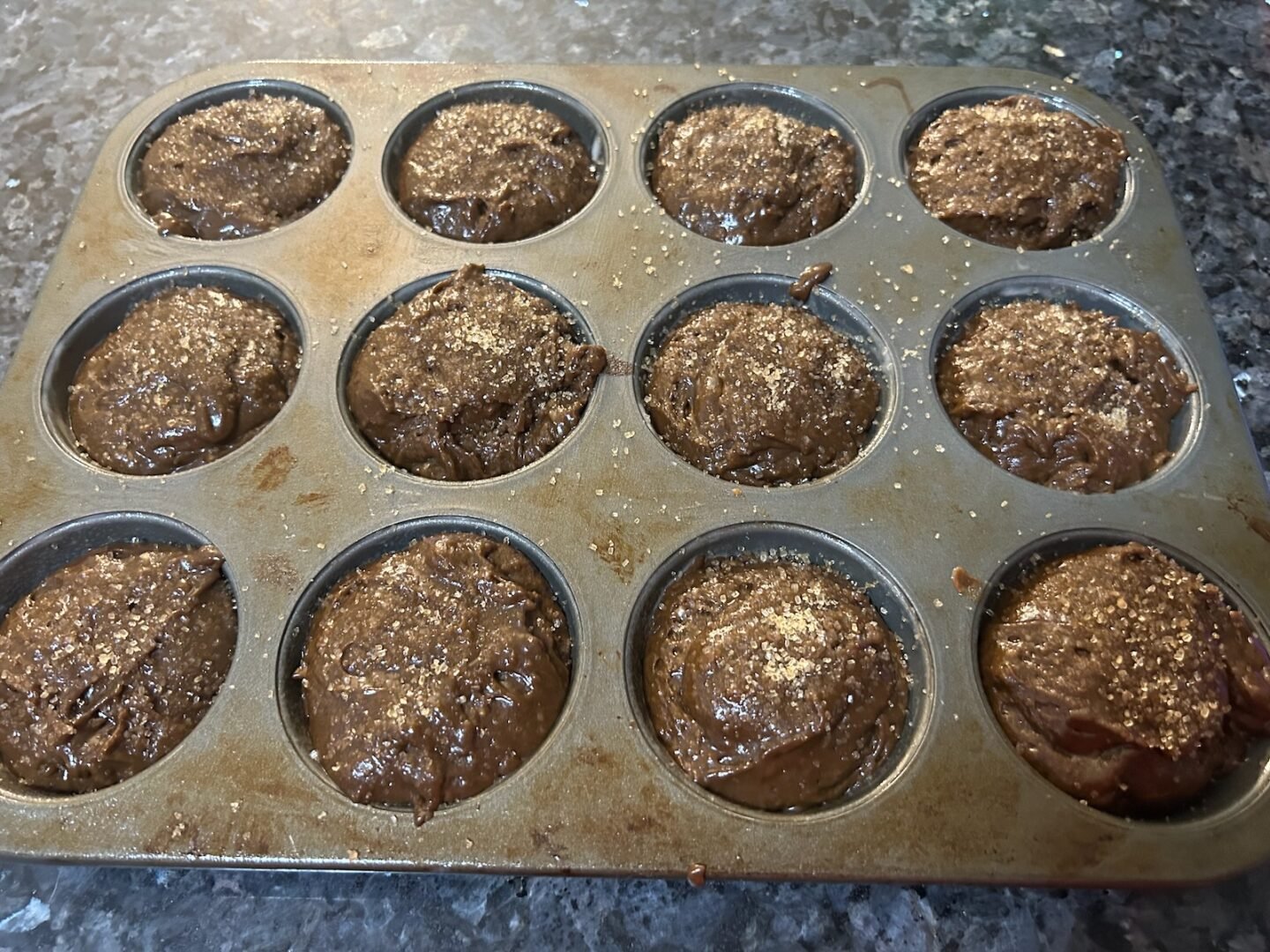 baked muffins still in tin