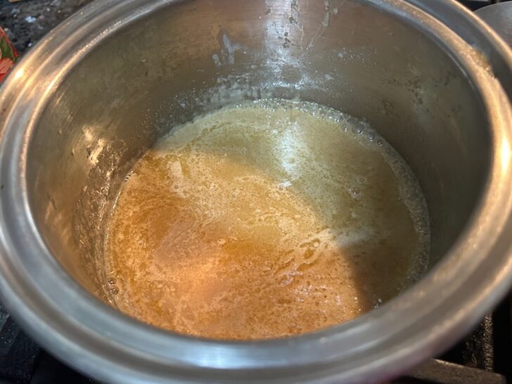 Brown Sugar Buttercream ingredients in saucepan on stove