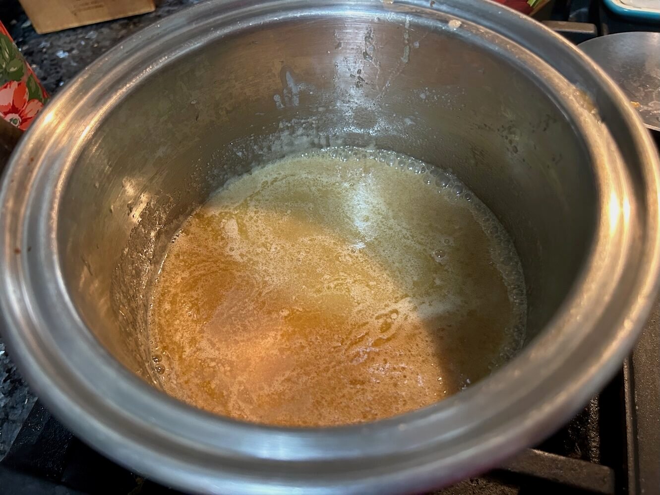 saucepan with melted butter and brown sugar