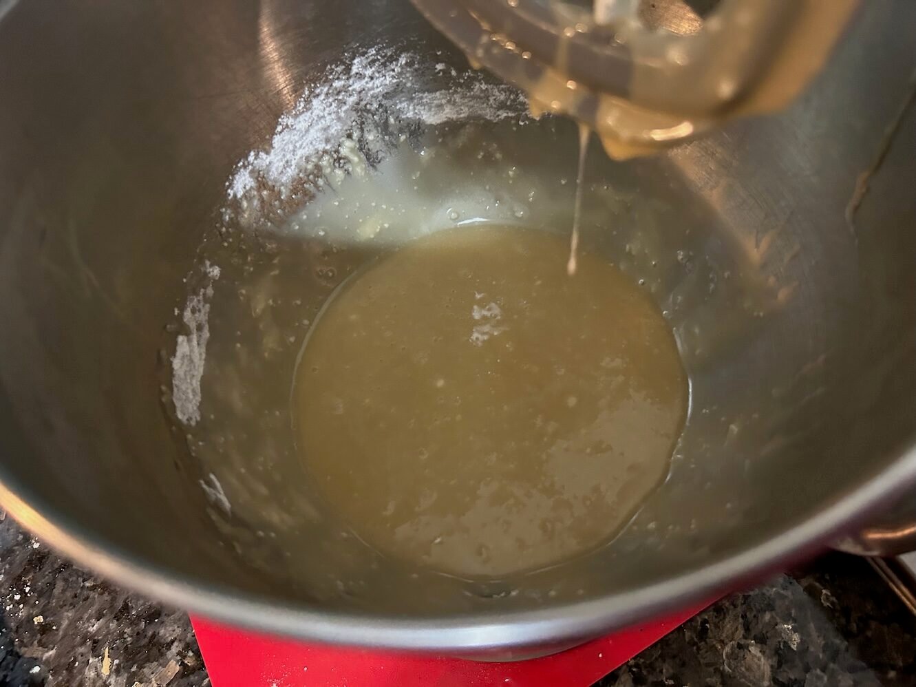 frosting ingredients melted in bowl