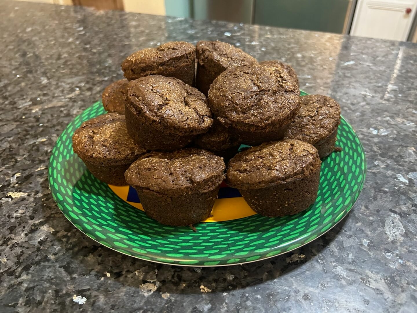 stack of spice muffins on plate