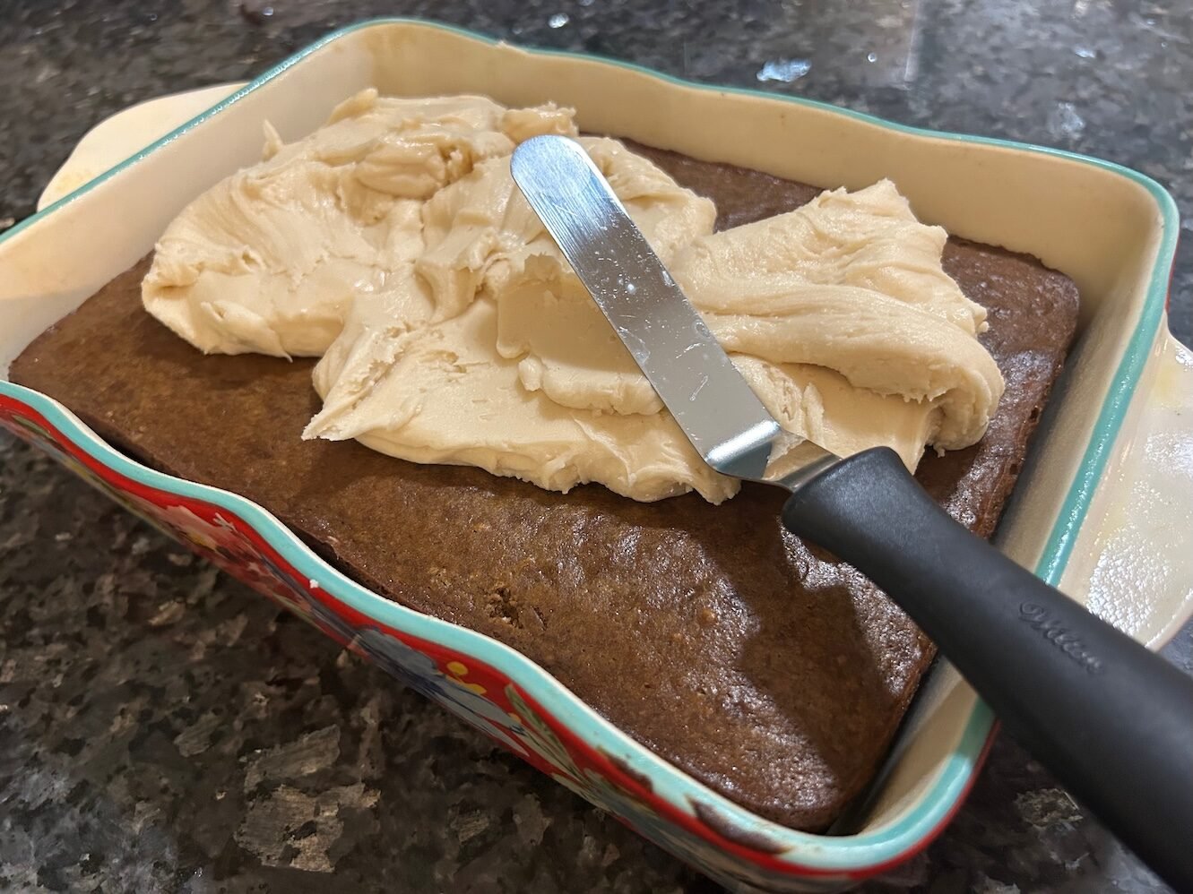 cake in the process of being frosted