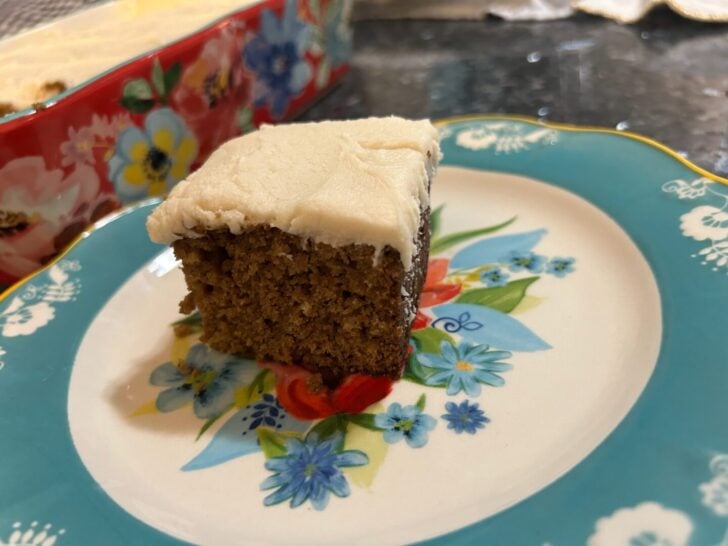 slice of cake with brown sugar buttercream on top