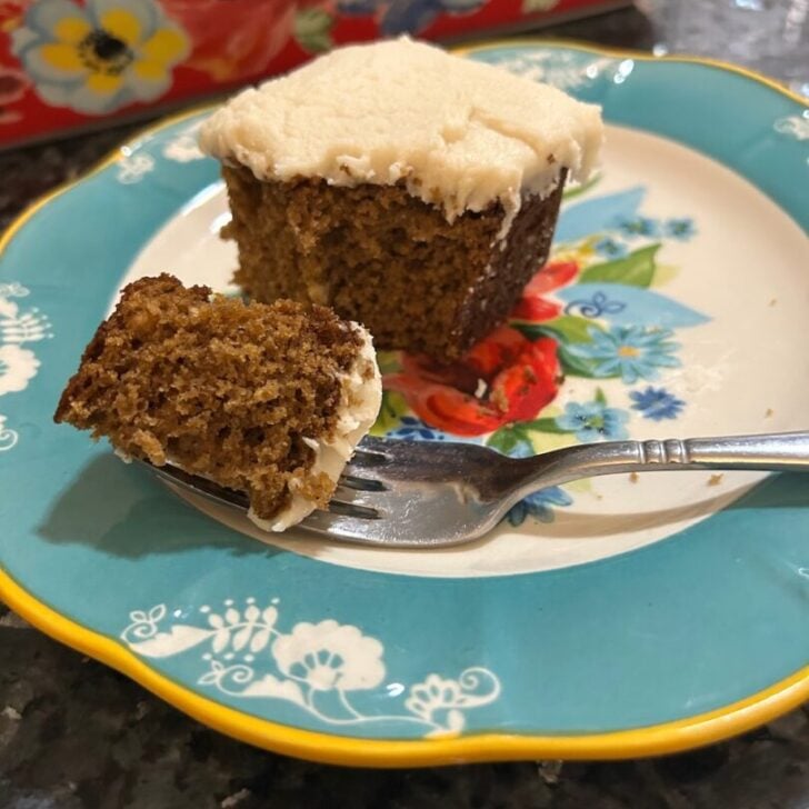 molasses cake on plate with fork