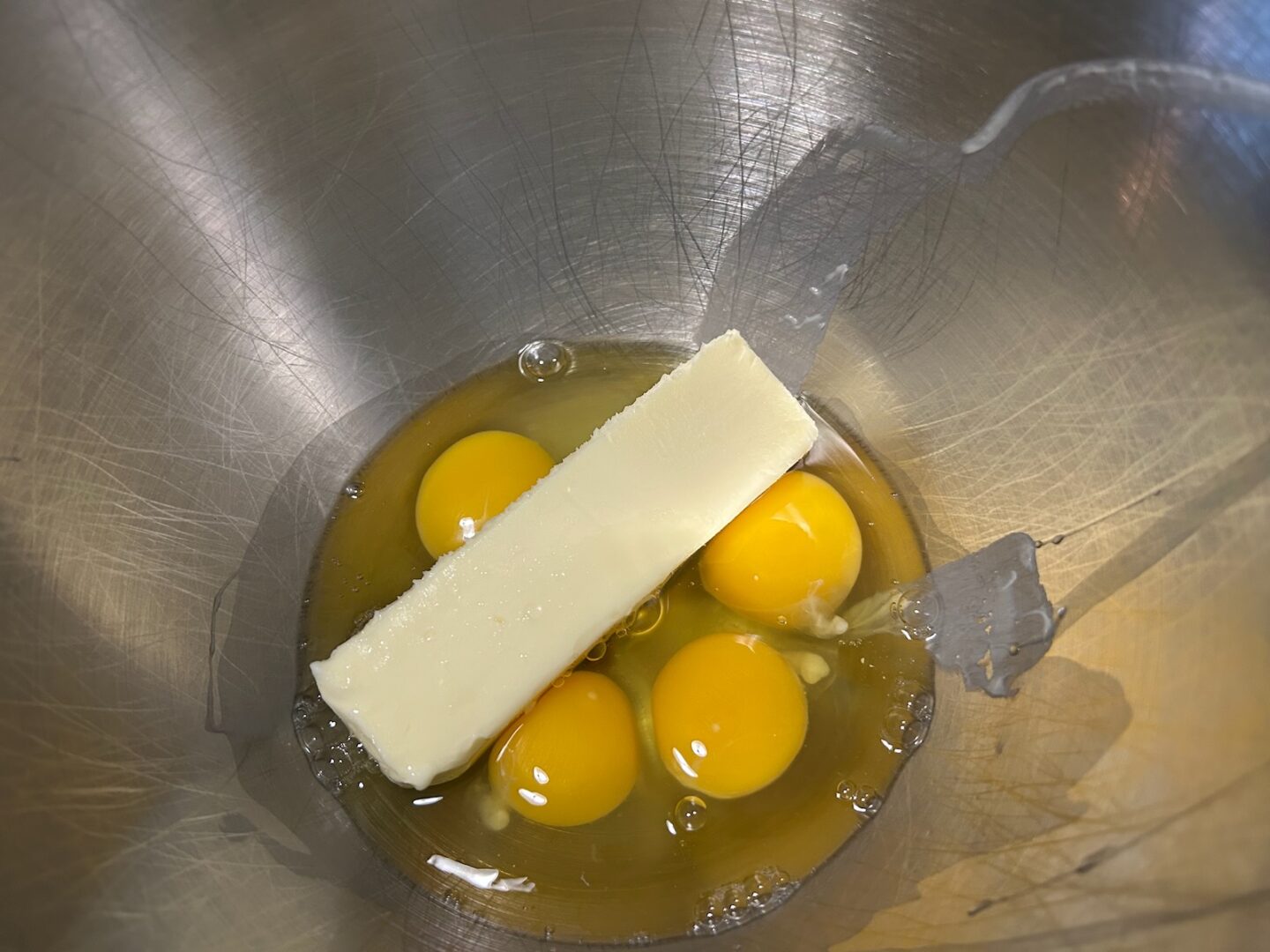 butter and eggs in mixing bowl