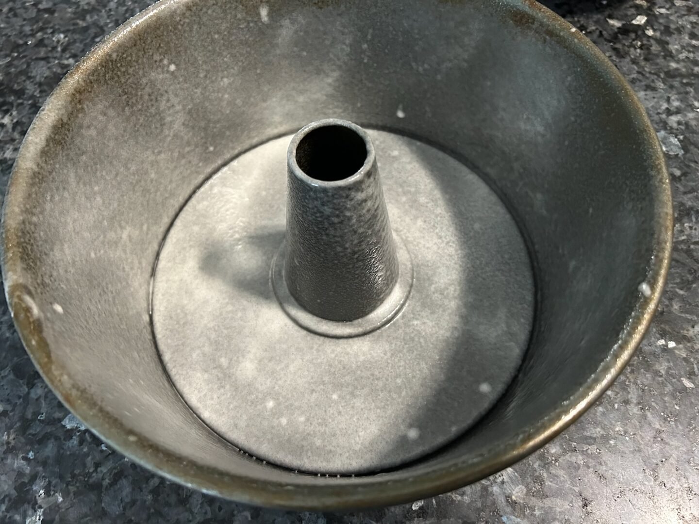 Tube pan sprayed with non-stick spray, ready for baking