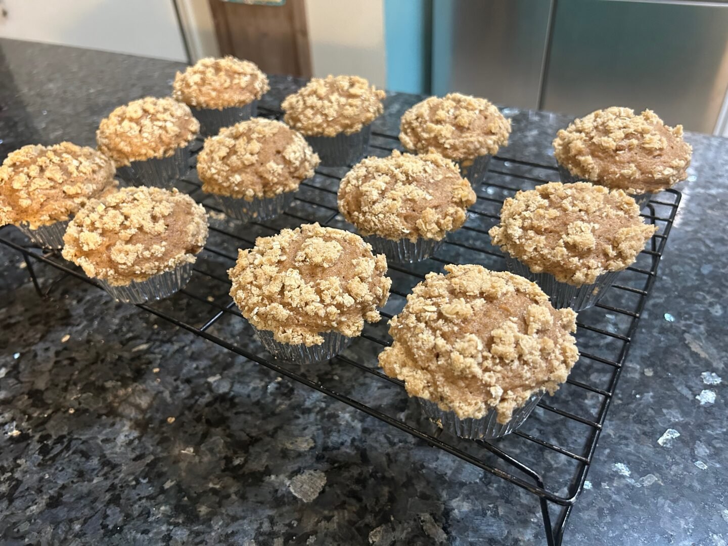 Sweet Potato Muffins with Oat Streusel Topping cooling on wire rack