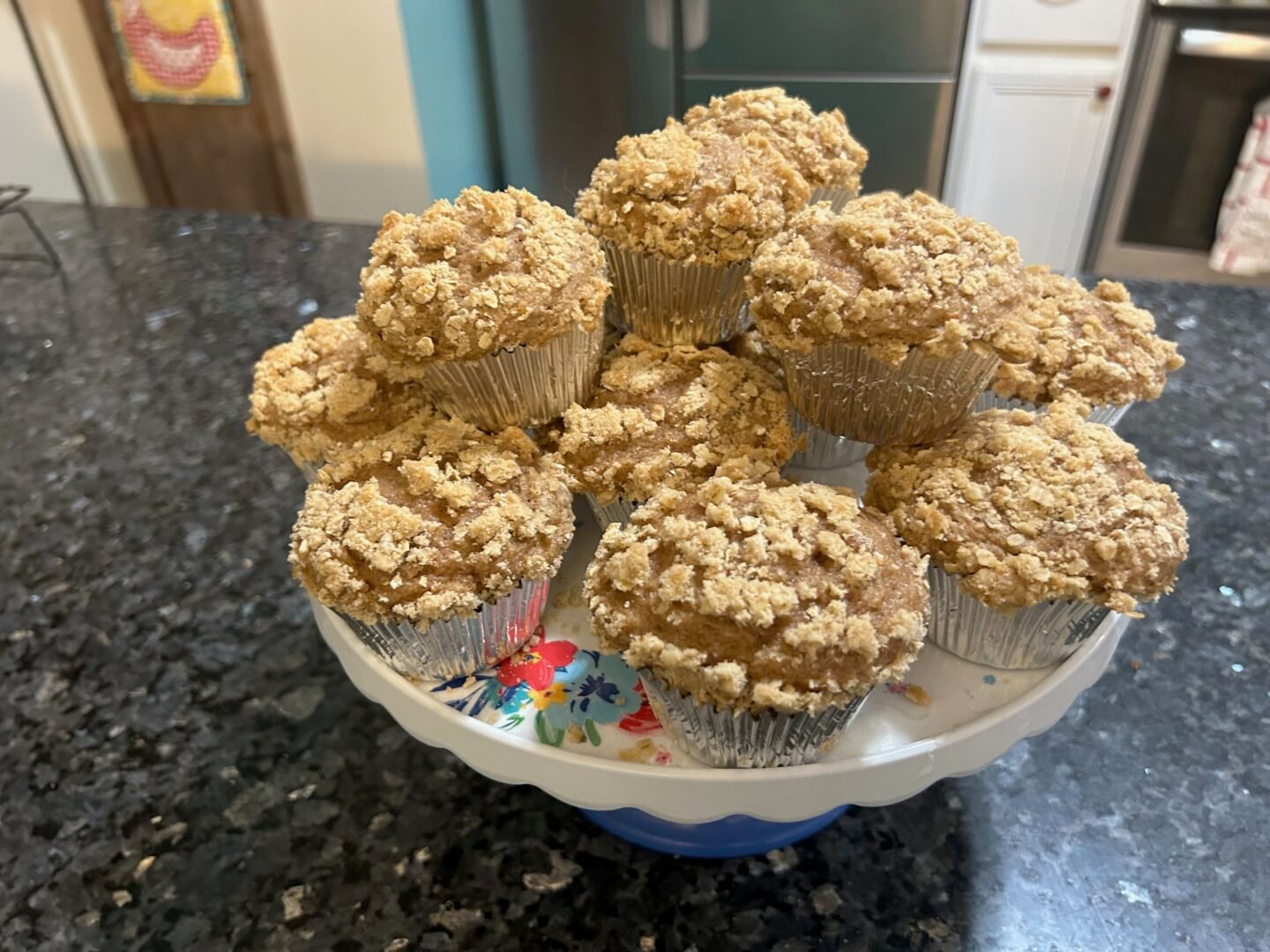 Sweet Potato Muffins with Oat Streusel Topping on cake stand