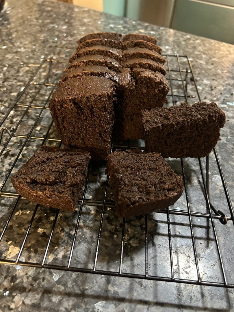 Jamaican Sticky Gingerbread sliced on cooling rack