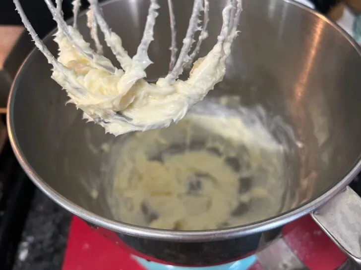 creamed butter in mixing bowl