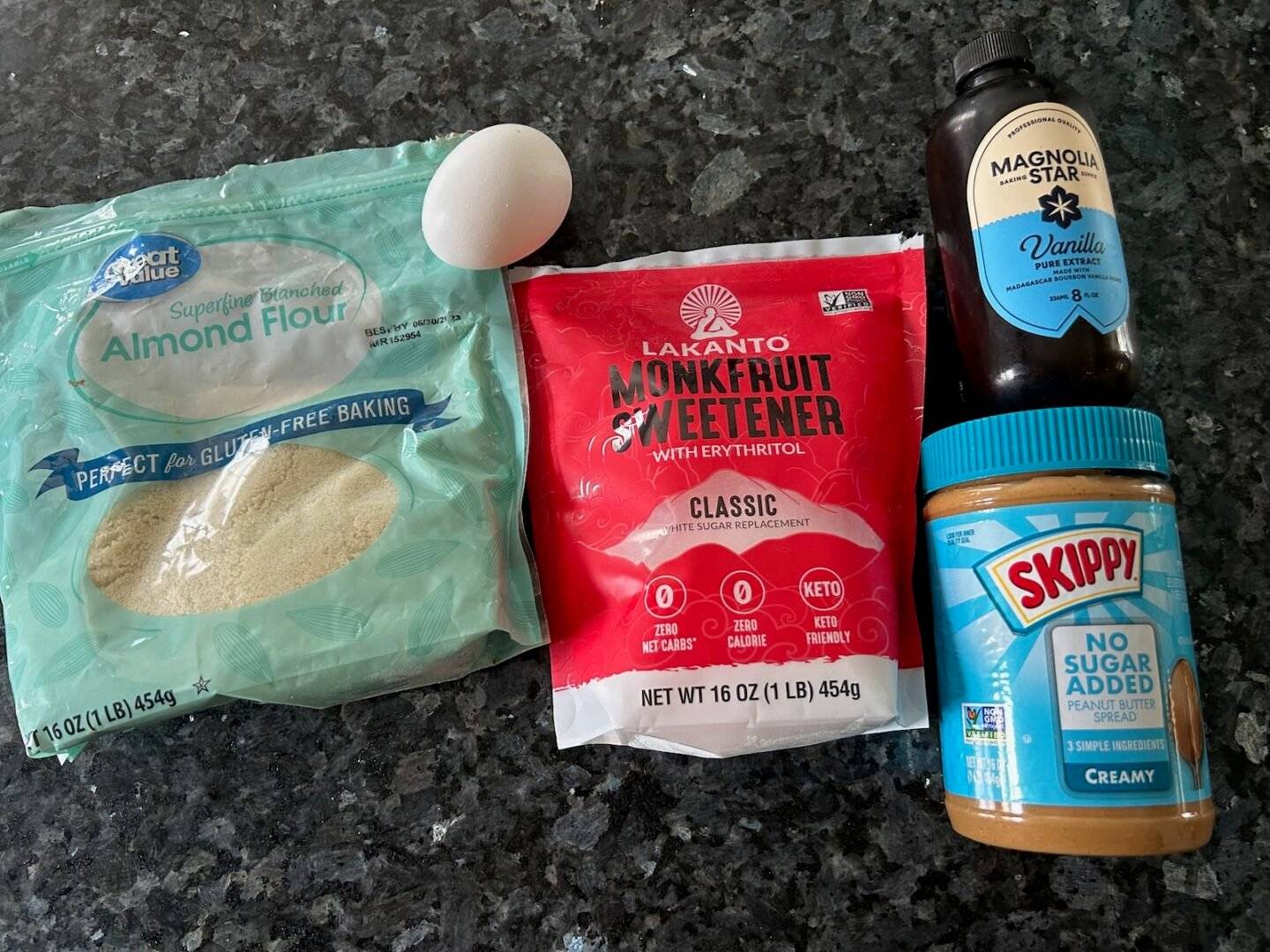 low carb peanut butter cookie ingredients: almond flour, egg, monk fruit sweetener, vanilla, sugar free peanut butter