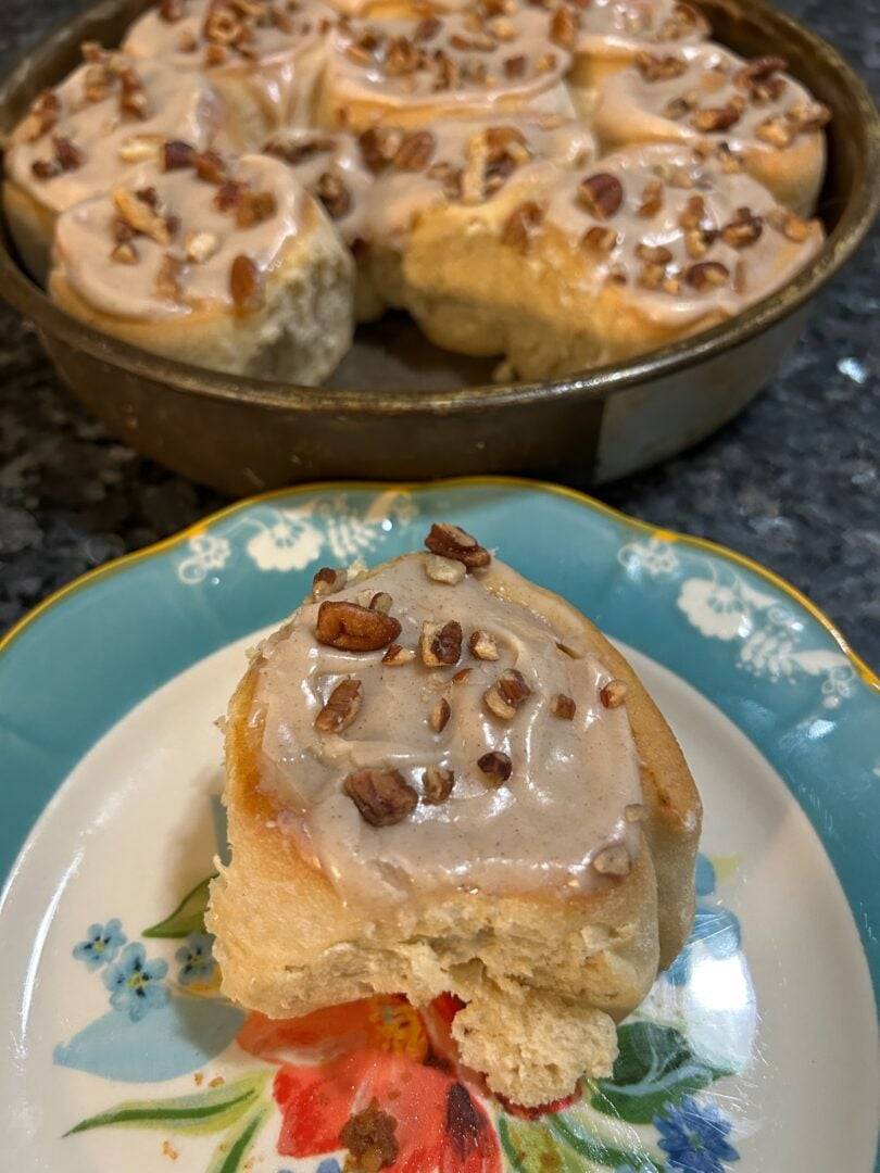 beautiful luscious cinnamon rolls on plate, ready to be eaten