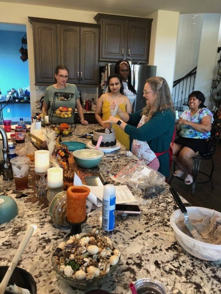 Janice Thompson, professional baker and author of over 170 books.  (Teaching a baking class.)
