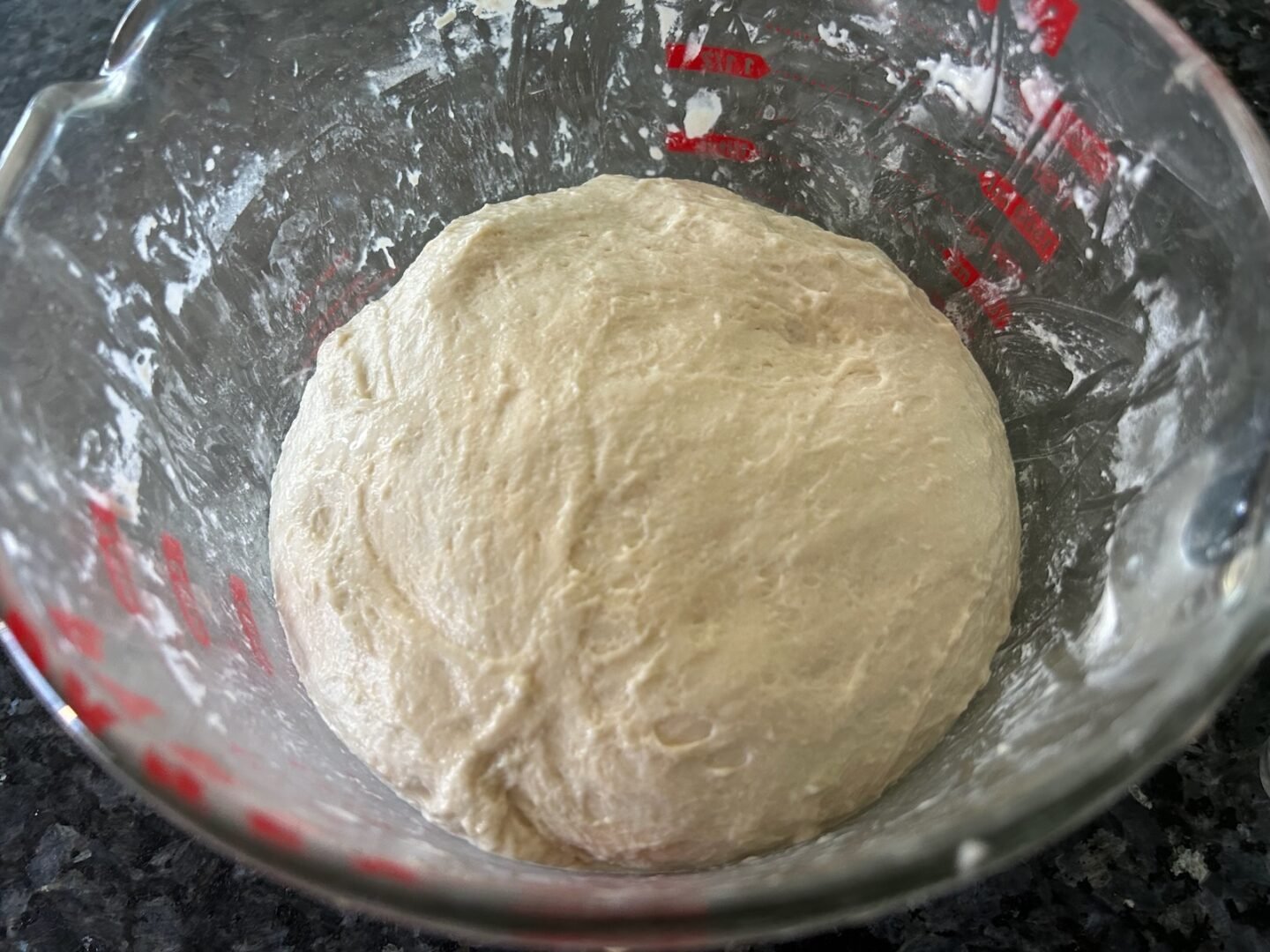 risen dough in bowl
