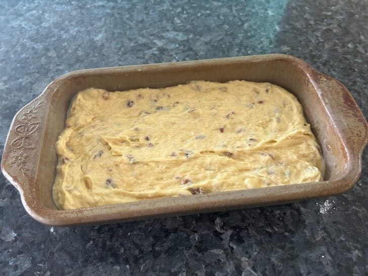 banana bread batter in loaf pan, ready to go in the oven