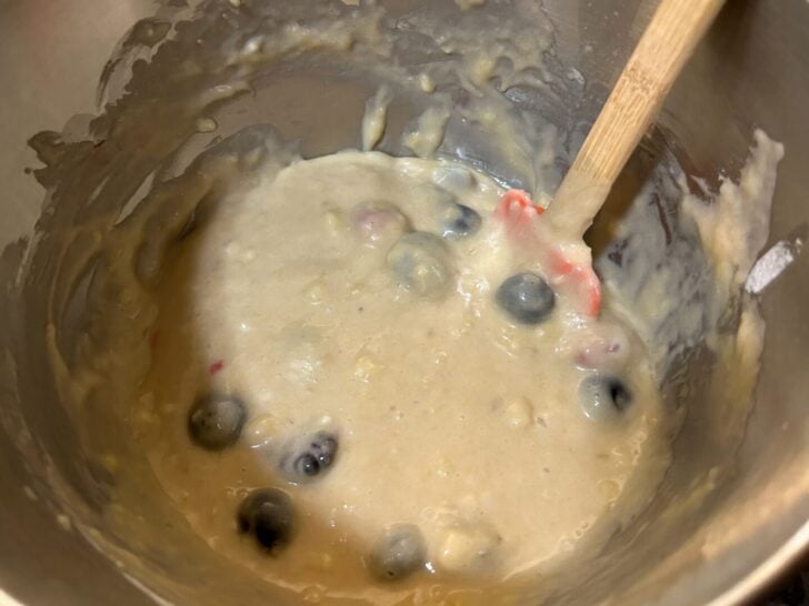 banana bread batter with berries added
