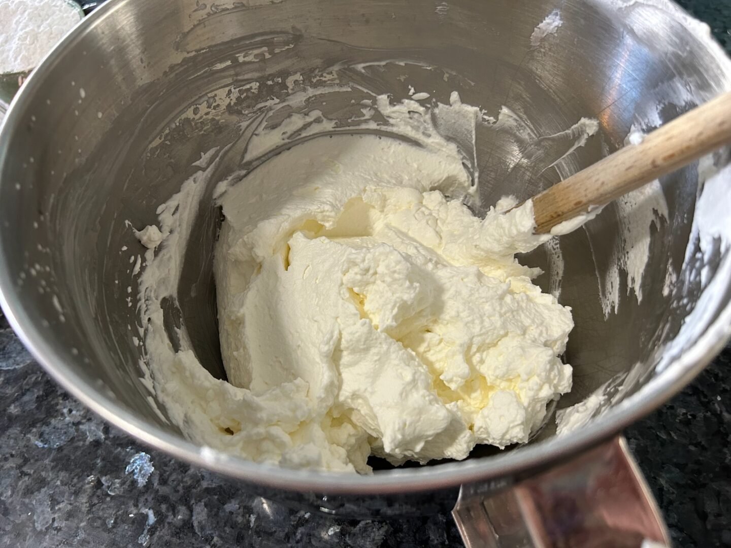 whipped cream in mixing bowl