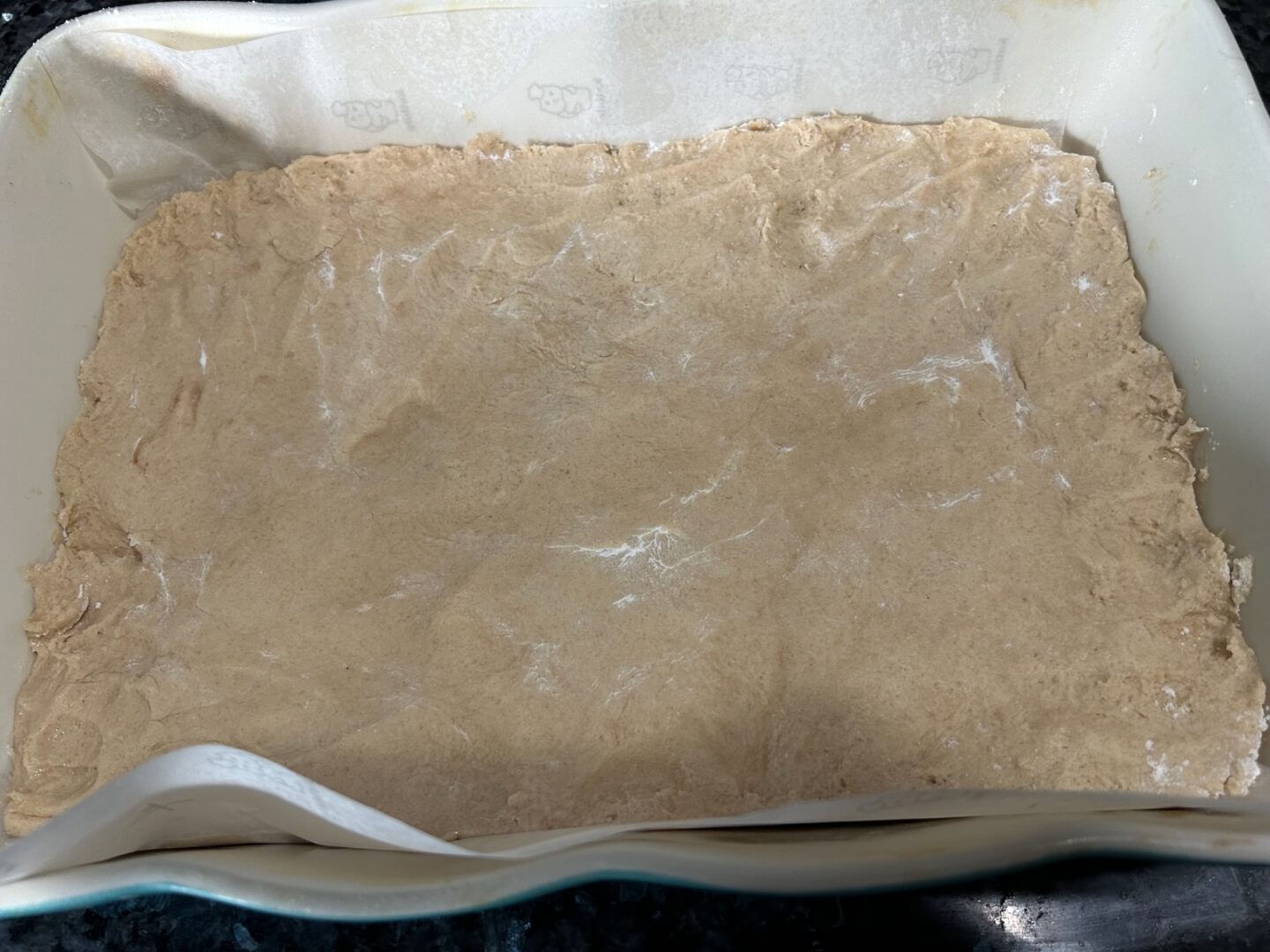 Caramel Apple Snickerdoodle Bar crust dough in pan