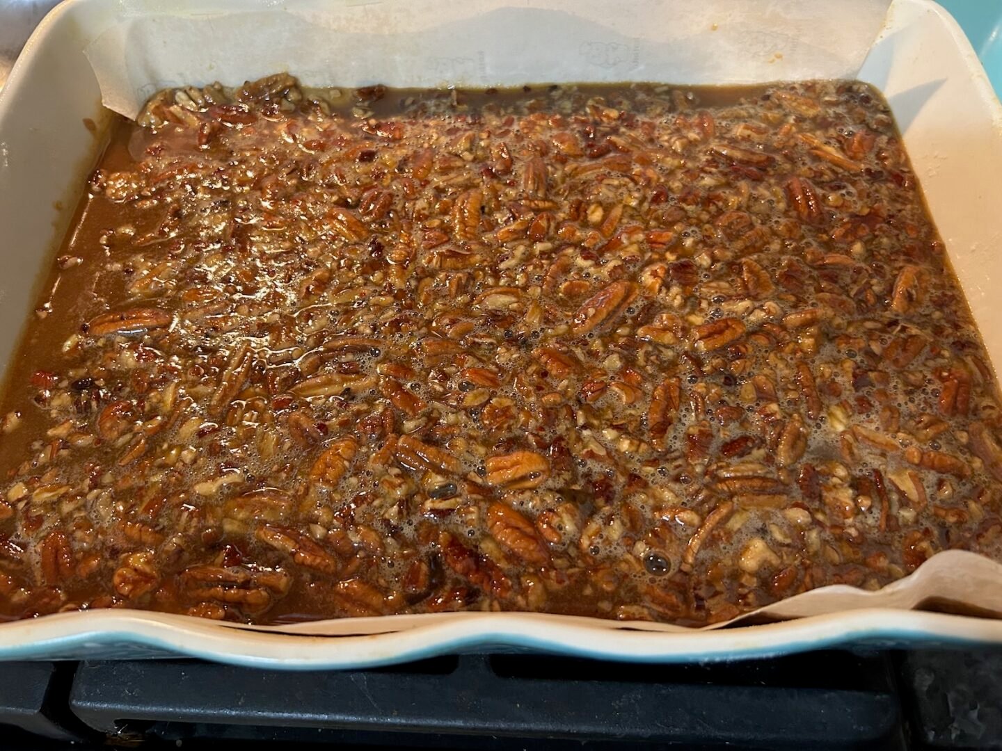 pecan pie topping poured on top of cookie base