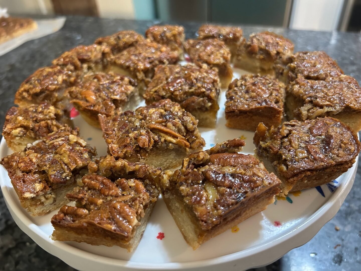 pecan pie snickerdoodle bars, cut and ready to serve