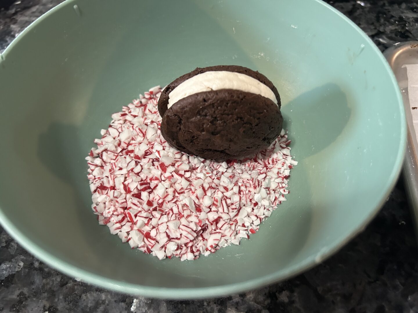 Candy Cane Whoopie Pies rolled in peppermint chips