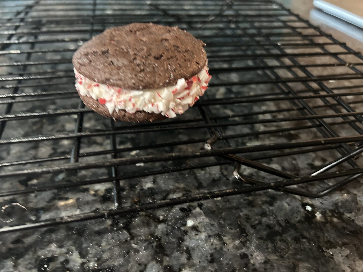 Candy Cane Whoopie Pies rolled in peppermint chips