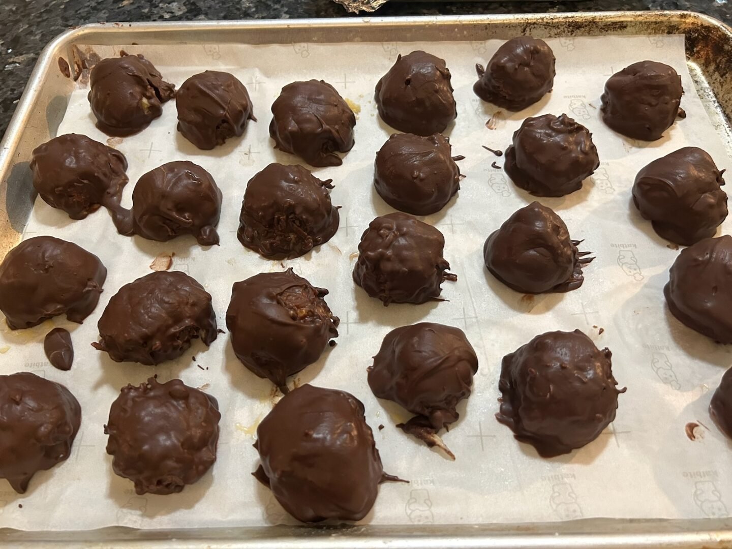 coconut balls with hardened chocolate exterior