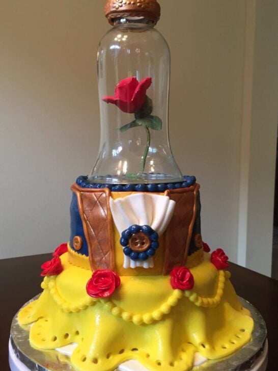 cake decorated with Beauty and the Beast vibe