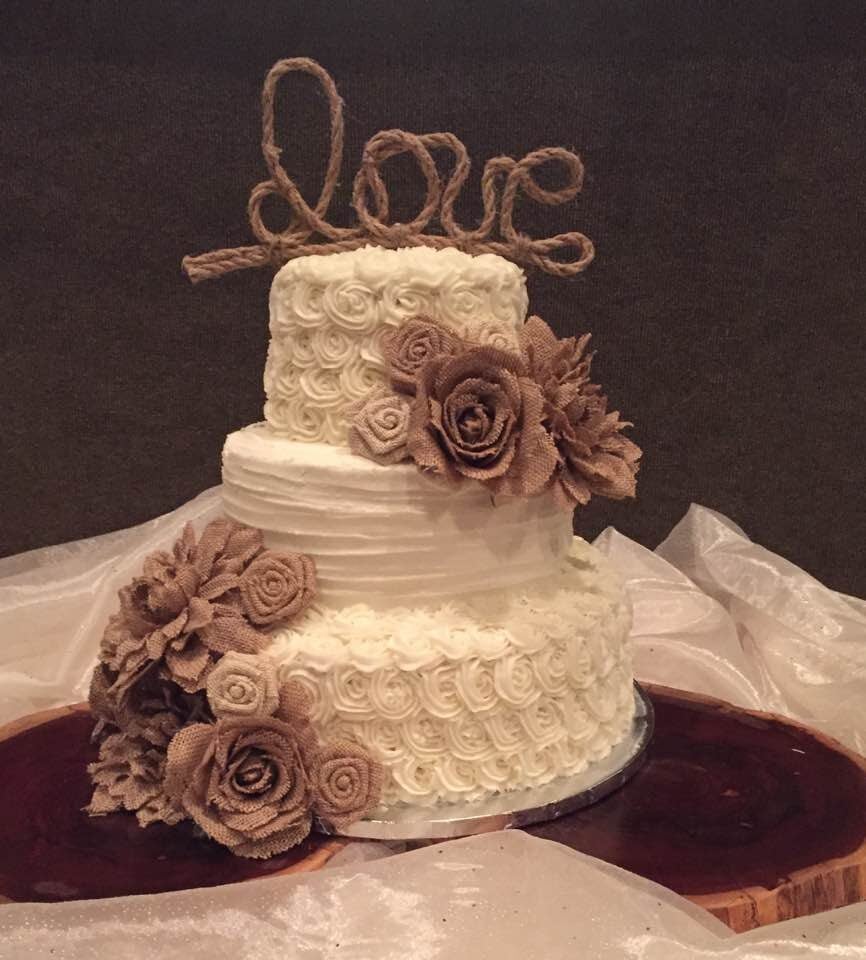 southern wedding cake with burlap flowers