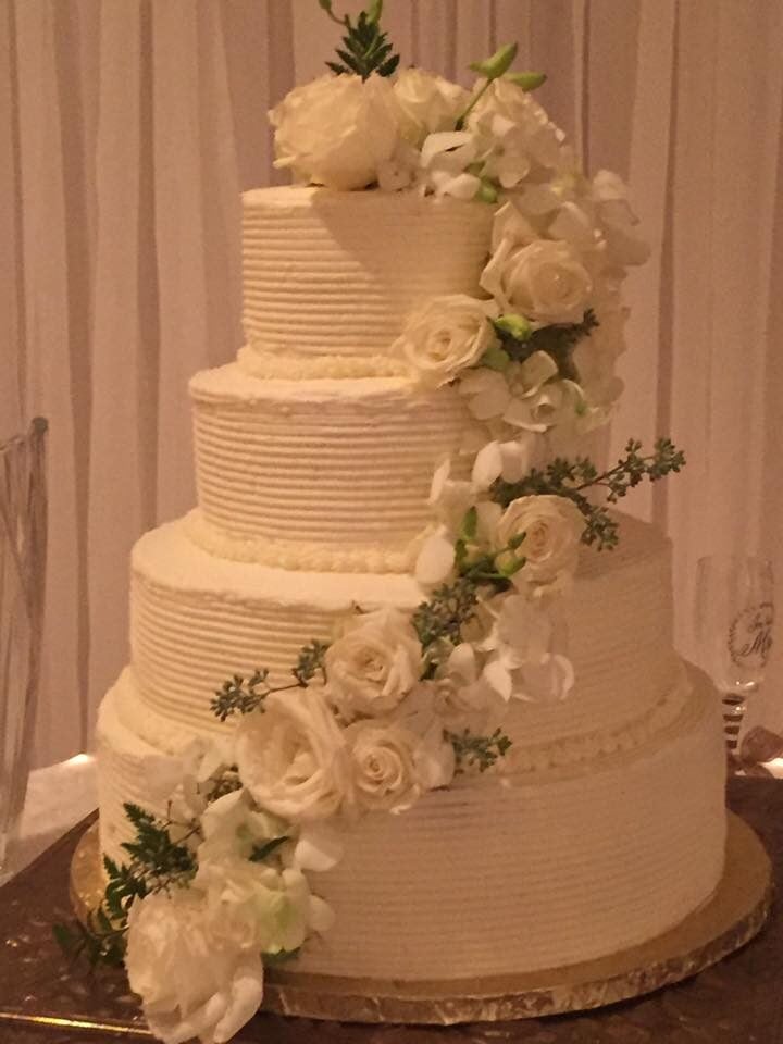 elegant wedding cake with white roses