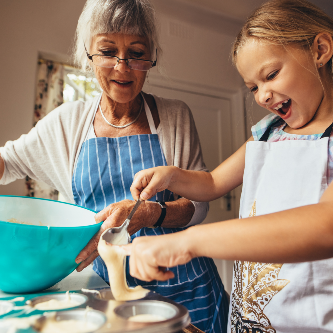girl baking with grandmother