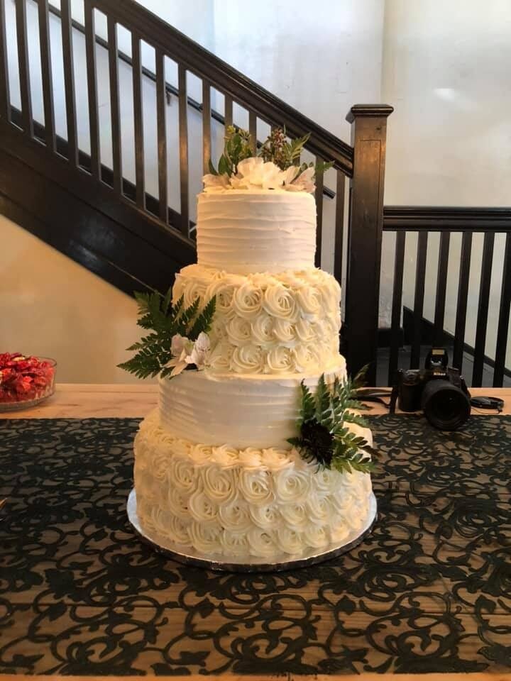 elegant wedding cake with greenery