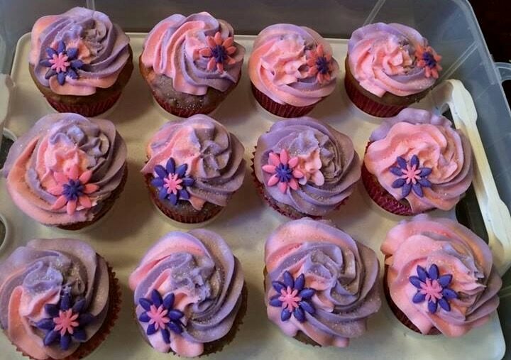 purple and pink frosted cupcakes