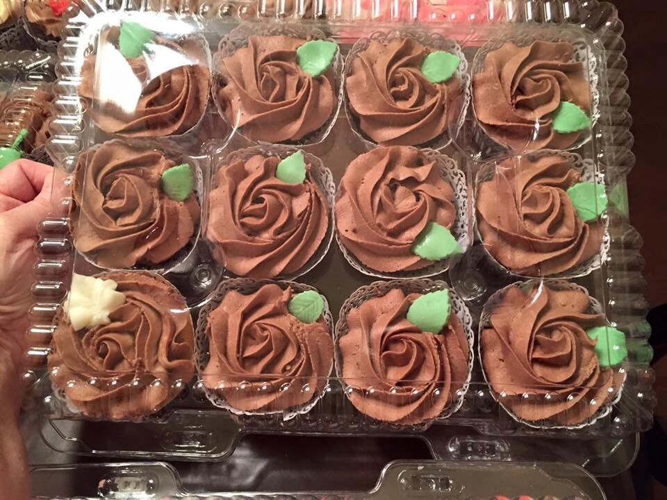 cupcakes frosted in chocolate buttercream swirls