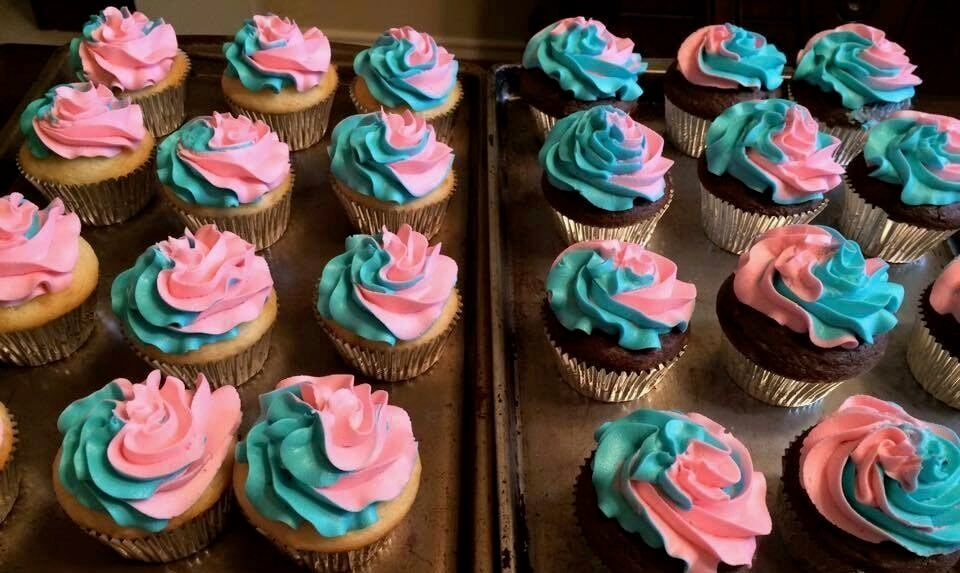 pink and teal frosted cupcakes for baby shower