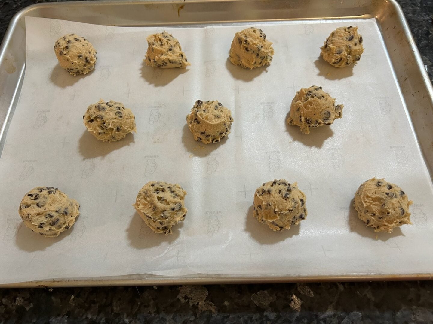 Rolls Royce Cookie dough balls on baking sheet
