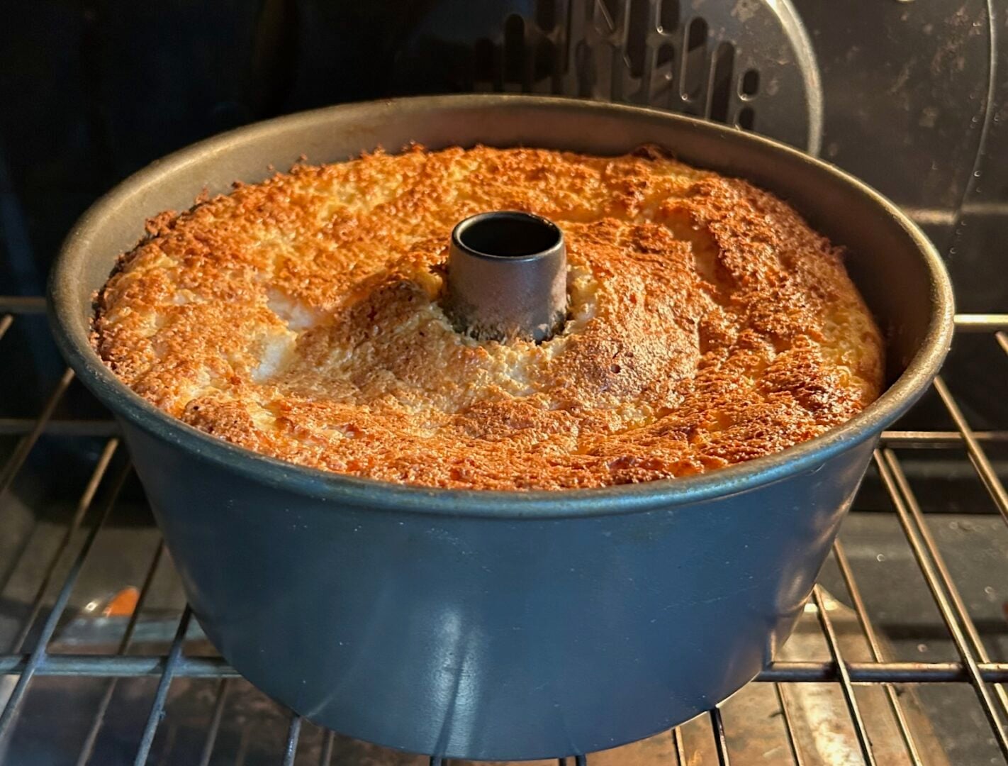 angel food cake in oven, fully baked (still in pan)