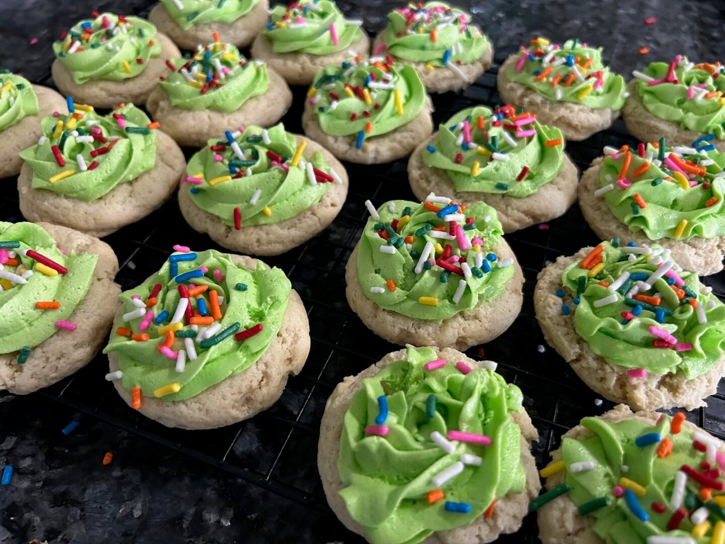 easter cupcakes, frosted in lime green and sprinkles