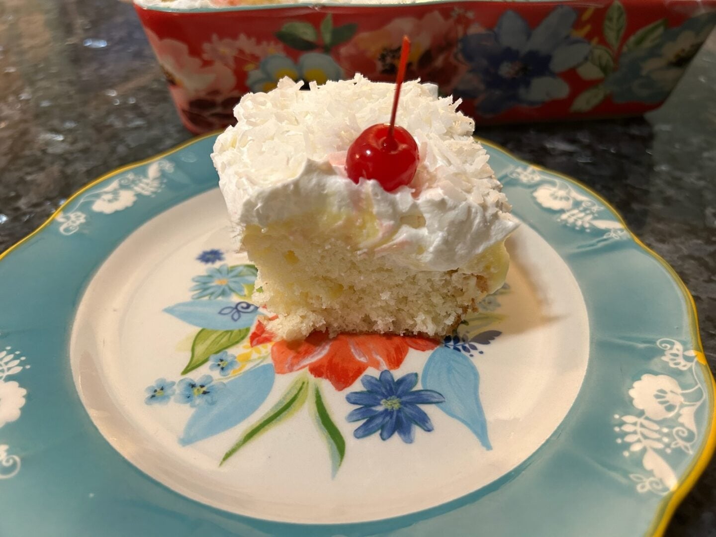 slice of Hawaiian Poke Cake (Hawaiian Cream Cake)