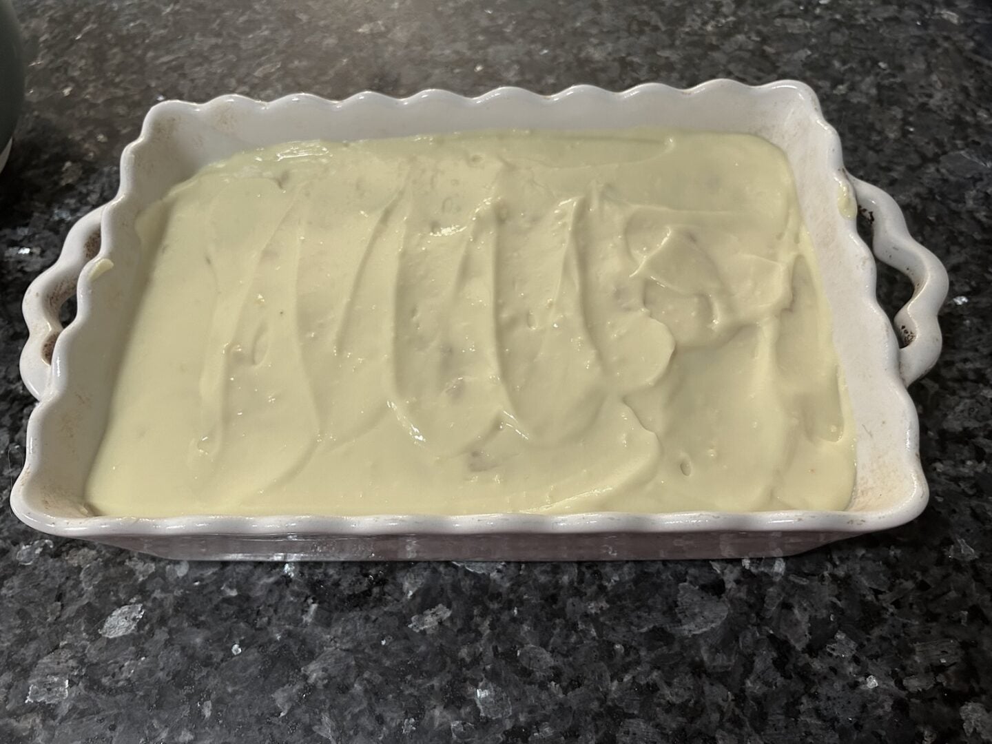 pudding on top of mandarin orange poke cake