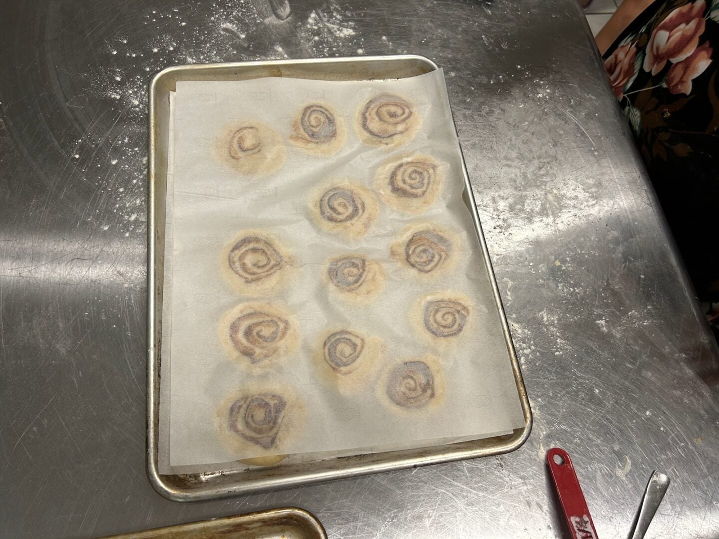 Homemade Honey Bun dough covered in parchment paper