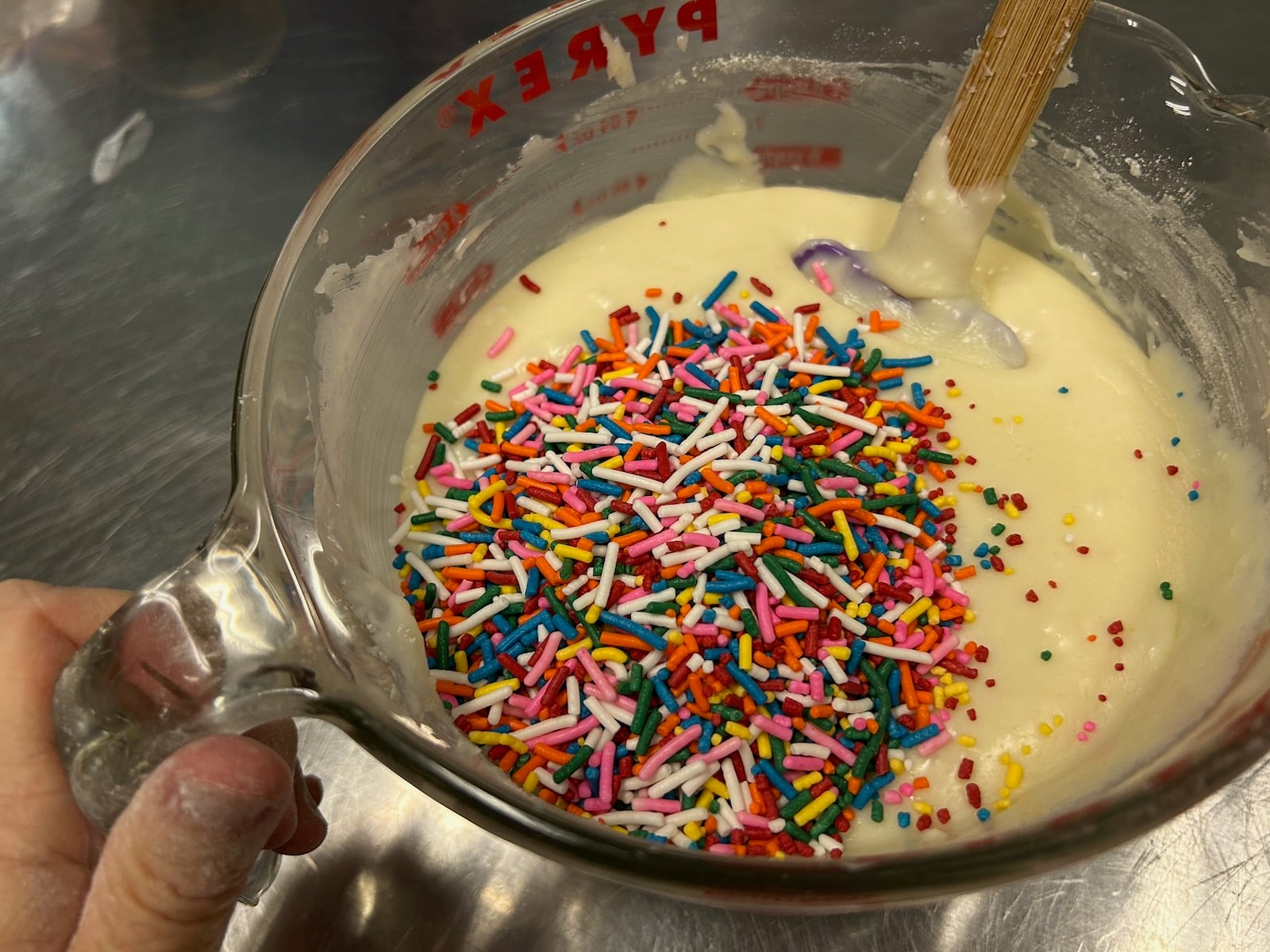 birthday cake fudge batter in bowl, sprinkles added
