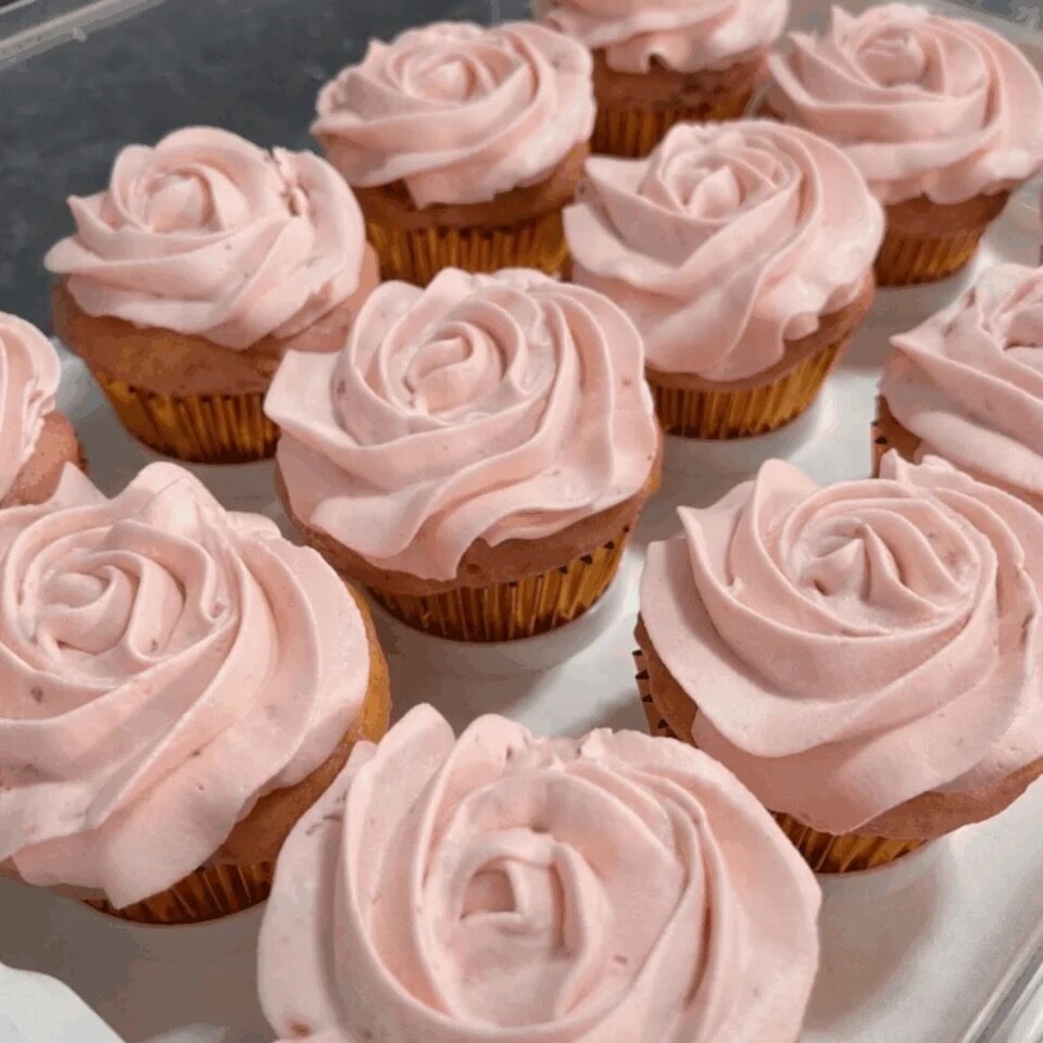 strawberry cupcakes with strawberry frosting swirls