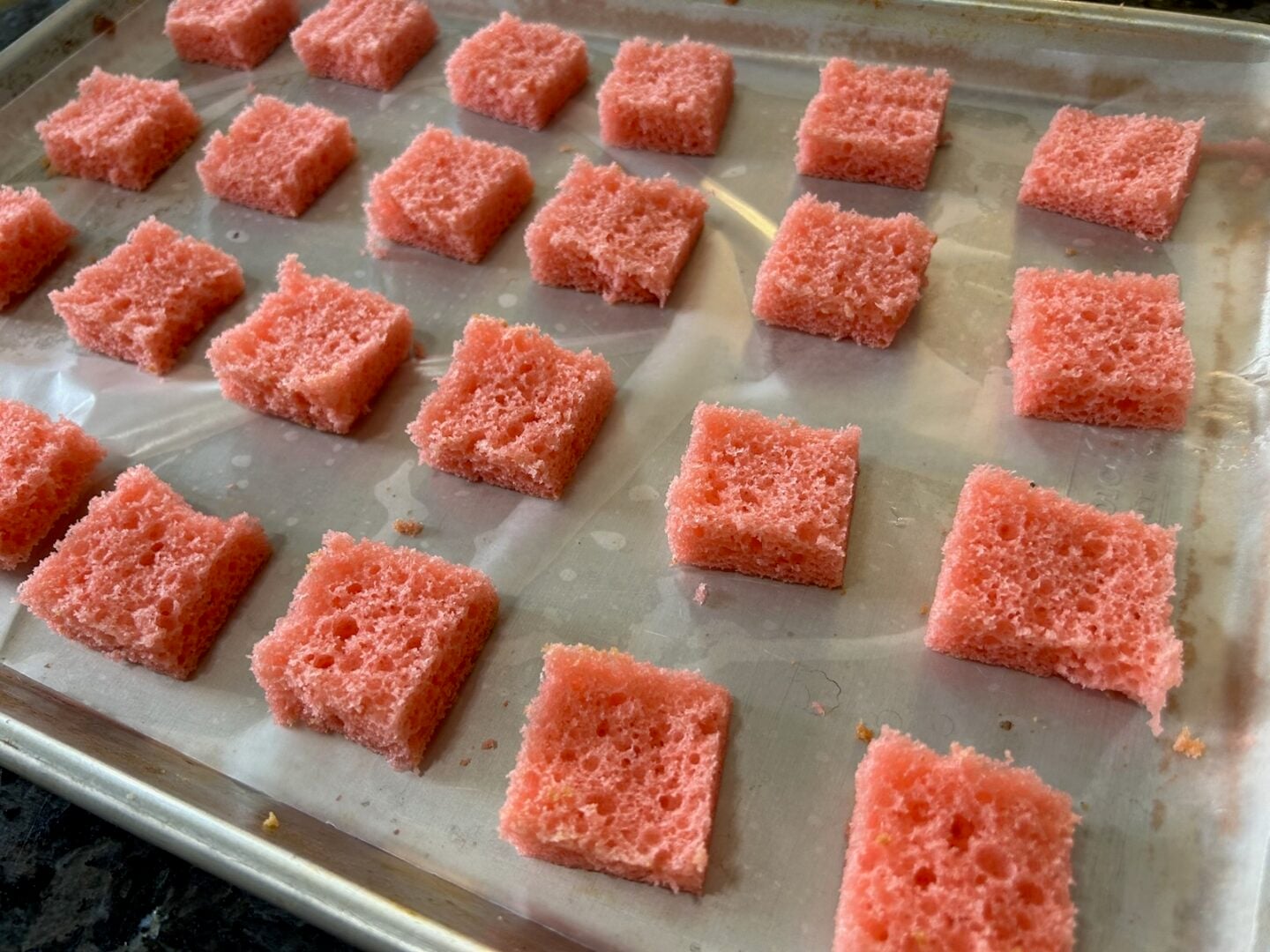 strawberry cake cut into squares